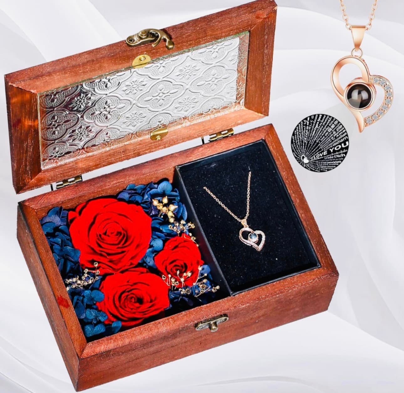 red rose, wooden box with heart necklace